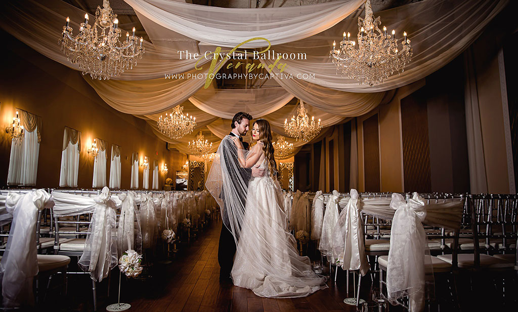 bride and groom in ceremony space at Crysal Ballroom